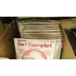 A box of various LPs, a box of various cutlery,