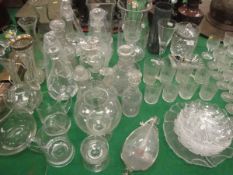 A collection of 19th Century and later cut glass decanters, various jugs, carafes, vases, etc,