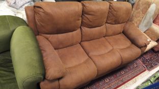 A modern three seater sofa with brown leather upholstery,