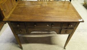 A 19th Century mahogany kneehole writing table,