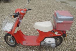 A Honda Melody Deluxe moped registration TPJ 453X