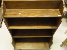 A modern mahogany waterfall bookcase