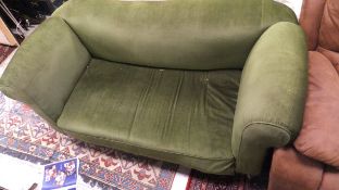 A 19th Century drop arm Chesterfield style sofa upholstered in green velour fabric