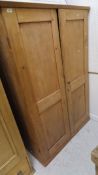 A pine two door wardrobe CONDITION REPORTS Height approx 171cm, external depth 49cm,