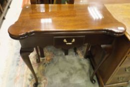 A modern mahogany tea table in the Victorian manner,