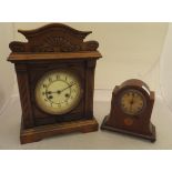 An Edwardian mahogany and inlaid mantel clock and a Victorian walnut cased Jughans mantel clock