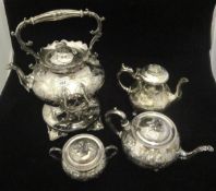 A Victorian silver plated spirit kettle, together with a similar three piece tea set,