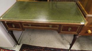 A modern mahogany writing table,