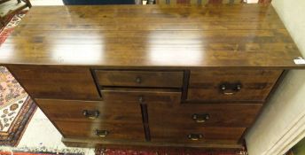 A Laura Ashley hardwood chest of eight assorted drawers,