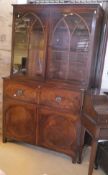 A 19th Century mahogany secretaire bookcase with astragal glazed doors enclosing adjustable shelves,
