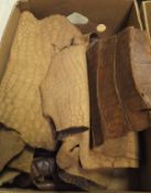 A box containing various crocodile skins