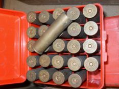 A collection of WW Greener brass cartridges (primed but unloaded) including 30 12-gauge,