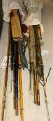 Two bundles of assorted fishing rods, to include spinning, course,