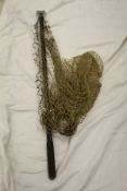 A Hardy folding salmon landing net