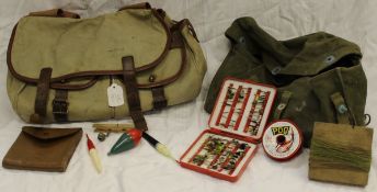 A canvas and leather salmon fisherman's bag containing various items of tackle