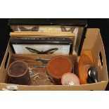 A box containing assorted sporting themed items to include leather cases, model pheasant,