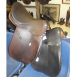 A Haynes of Cirencester dressage saddle together with another similar