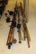 A large collection of rods and reels to include a 3" alloy trout fly reel,