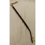 A lady's riding crop with plaited leather shaft and antler handle