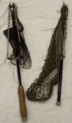 A pair of vintage folding trout landing nets