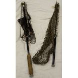 A pair of vintage folding trout landing nets