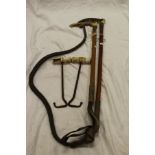 Two antler handled riding crops,