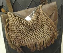 A leather Falconers bag with tasselled net CONDITION REPORTS Leather is worn and