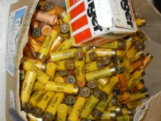 A box of 20-gauge cartridges including Yellow Wizard Rustless 6-shot,