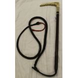 A riding whip with antler handle and plated ferrule stamped "Swaine" with plaited leather shaft and