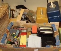 Two boxes containing a large quantity of assorted fishing tackle,