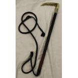 A riding crop with antler handle and plated ferrule stamped "Swaine Made in England" above a