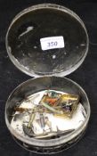 a Japaned tin containing a collection of fishing lures to include examples by Hearder of Plymouth,