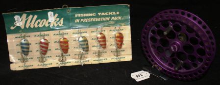 A DAM "Robo" five and seven-eighth inch diameter centre pin fishing reel with purple spool and an