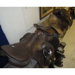 A leather general purpose saddle with Sydney Free label together with a Hayes of Cirencester