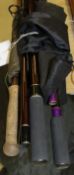 A Shimano "Twin Power" salmon fly rod, 13'4" long, a Masterline "Shadow" carp rod,