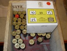 A box of various 10-gauge live cartridges including Remington Peters, Eley-Kynoch,