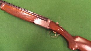 A Browning "Medallist Sporter" 12GA shotgun, double barrel, over and under, ejector,