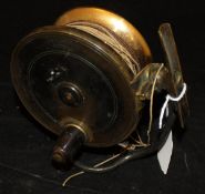 A Malloch's patent side casting reel with three and three quarter inch spool and rim mounted