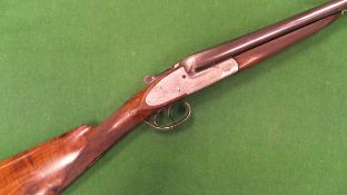 A Hogan & Colbourne 12 bore shotgun, double barrel, side by side, side lock, ejector,