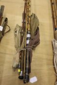 A collection of three assorted fishing rods, to include a Sealey Octopus two-piece spinning rod,