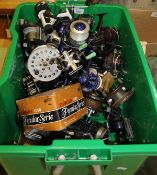 A collection of 34 assorted fishing reels, to include fixed spool reels, multiplying reels,