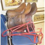 Three racing saddles,