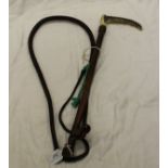 A plaited leather and antler handled riding crop