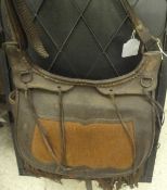 A leather cartridge/game bag with net and hide panel