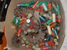 A box of various loose 12 gauge cartridges including Holland and Holland 6-shot,