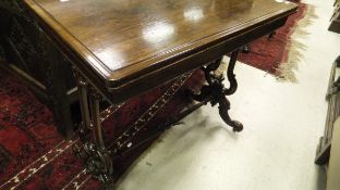 A Victorian rosewood card table,