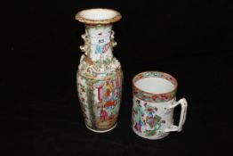 A 19th Century Chinese porcelain vase decorated in the famille-rose palette with panels depicting