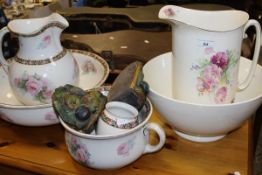 A 1920's rose pattern four piece toilet jug and bowl set,
