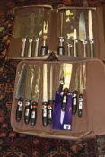 A Goldfish nine piece knife set in case and a Goldfish nine piece knife set in roll*