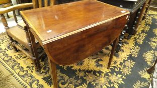A Regency mahogany and inlaid Pembroke table,